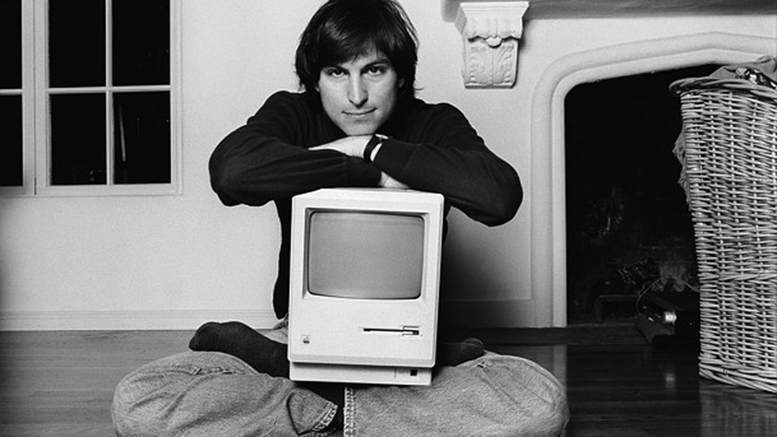 Steve Jobs with his Macintosh